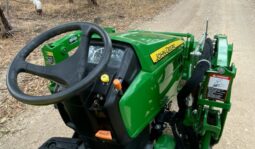 
										Tractopelle John Deere 1023E full									